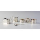 A selection of silverware, to include; a George V silver wet mustard pot, S Blanckensee & Sons