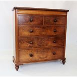 A Victorian mahogany chest of drawers, the rectangular top with rounded front corners, above a