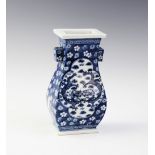 A Chinese porcelain blue and white Hu vase, Kangxi four character mark, of typical form and
