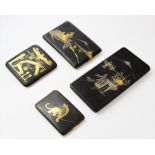 Four Japanese shakudo/Komei cigarette cases, Meiji period and later, comprising; a hieroglyphic