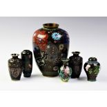 A Japanese cloisonne vase, Meiji period, 1868 - 1912, geometrically decorated with roundels of