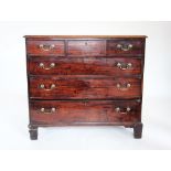 A George III mahogany chest of drawers, the rectangular moulded top above three short and three long