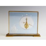 A Jaeger Le Coultre Marina mantel clock, the rectangular lacquered brass and lucite panel