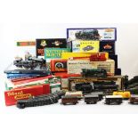 An extensive collection of OO gauge model railway equipment, to include locomotives, carriages,