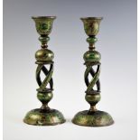 A pair of papier mache kashmiri candlesticks India, late 19th century, the open twist stems