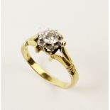 A diamond solitaire ring, the central round brilliant cut diamond weighing approx. 0.22 carat,