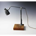 A Singer LF5 sewing machinist's work lamp, mid 20th century, the shade of bullet form with