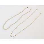 A yellow metal pearl set necklace, the mixed link chain interspersed by six round cultured pearls,