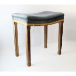 A Queen Elizabeth II limed oak coronation stool, the blue velour concave upholstered seat raised