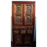 A Chinese stained wood cabinet, 20th century, the upper sections with pair of glazed doors with