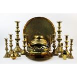 A collection of brassware, to include five pairs of brass candlesticks, the tallest 36cm high, an