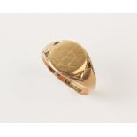 A 9ct gold signet ring, the central panel engraved with monogrammed initials 'CH', to a tapering