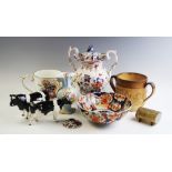 A selection of British and Continental ceramics to include a 19th century loving cup, 15cm high, a