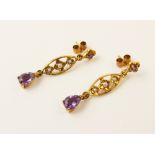 A pair of amethyst and pearl set 9ct gold drop earrings, each designed as a quatrefoil flower set