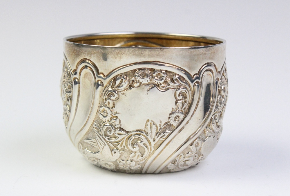 A Victorian silver sugar bowl by Goldsmiths & Silversmiths Co, London 1895, the exterior panels with