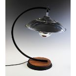 An Art Deco style table lamp, late 20th century, the bowl shaped chromed shade supported on a 'C'