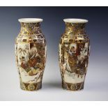 A pair of Japanese Satsuma vases, 20th century, the hexagonal vase decorated two panels depicting