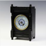 A late 19th century Japy Freres aesthetic movement mantel clock, with a scalloped gallery above