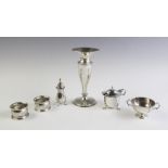 A selection of silver tableware, to include, an Edwardian weighted silver posy vase, Chester 1901, a