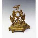 A French cast gilt metal pocket watch stand, late 19th century, designed as two caryatid type