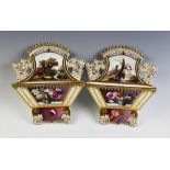 A pair of Coalport wall pockets/card holders, circa 1820, each extensively painted with floral