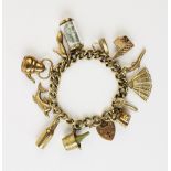 A 9ct gold charm bracelet, comprising a 9ct gold curb-link bracelet, with a heart-shaped padlock