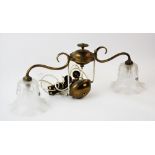 An Art Nouveau style rise and fall twin branch pendant light fitting, in the manner of J W Benson,
