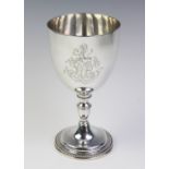 A silver Chalice by John Denzilow, London 1818, of typical form with beaded detail to knopped stem