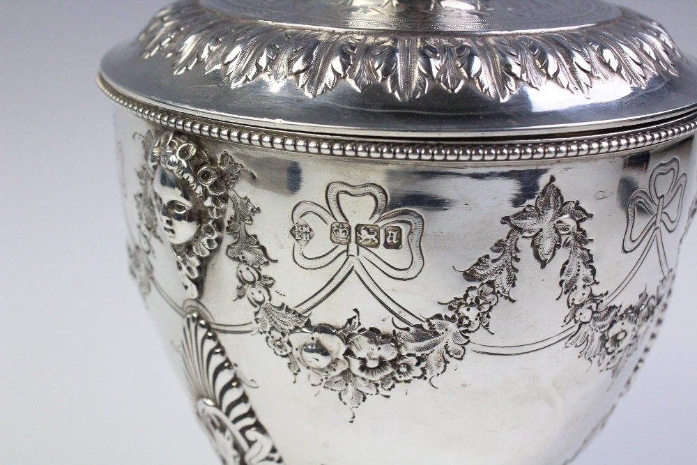 A late Victorian silver caddy by Martin, Hall & Co, Sheffield 1893, the urn shaped body resting on - Image 4 of 7