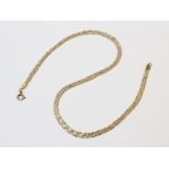 A three-colour 9ct gold necklace, comprising interwoven herringbone link chains in gold, rose gold