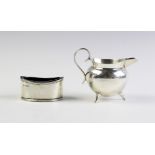 A Victorian silver cream jug by Mappin & Webb, Sheffield 1896, the cauldron form jug with