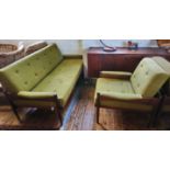 A mid 20th century Indian rosewood three piece lounge suite, with a cushioned back and seat raised