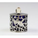 A Victorian silver mustard pot by Charles Stuart Harris, London 1891, of cylindrical form with