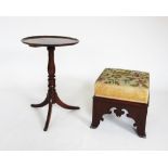 A 19th century Gothic influence mahogany foot stool, the rectangular upholstered tapestry seat above