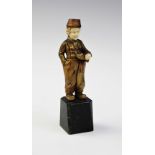 An Art Deco bronze and ivory model of a boy, in the manner of D.H.Chiparus, designed as a boy