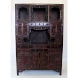 A large Chinese stained wood display cabinet, early 20th century, with arrangement of two open