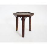 A George III mahogany cellarette stand, the hexagonal top raised upon three chamfered legs of square