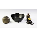 A collection of Japanese patinated bronze and metal items, 19th century and later, comprising; an