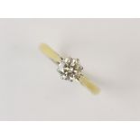 A diamond solitaire ring, the central round brilliant cut diamond weighing approx. 0.60ct, claw
