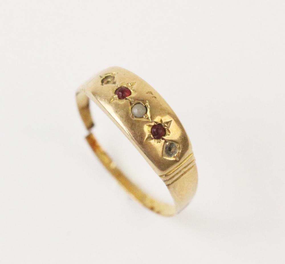An early 20th century ruby and pearl set ring, comprising a small seed pearl with a small mixed - Image 2 of 3