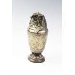 A white metal Egyptian canopic jar horus, modelled as an eagle, 28cm high