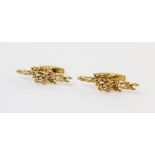 A pair of vintage 9ct gold cufflinks by D Shackman & Sons, London 1971, of abstract organic form,