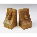 Workshop of Robert 'Mouseman' Thompson of Kilburn, a pair of English Oak bookends, late 20th