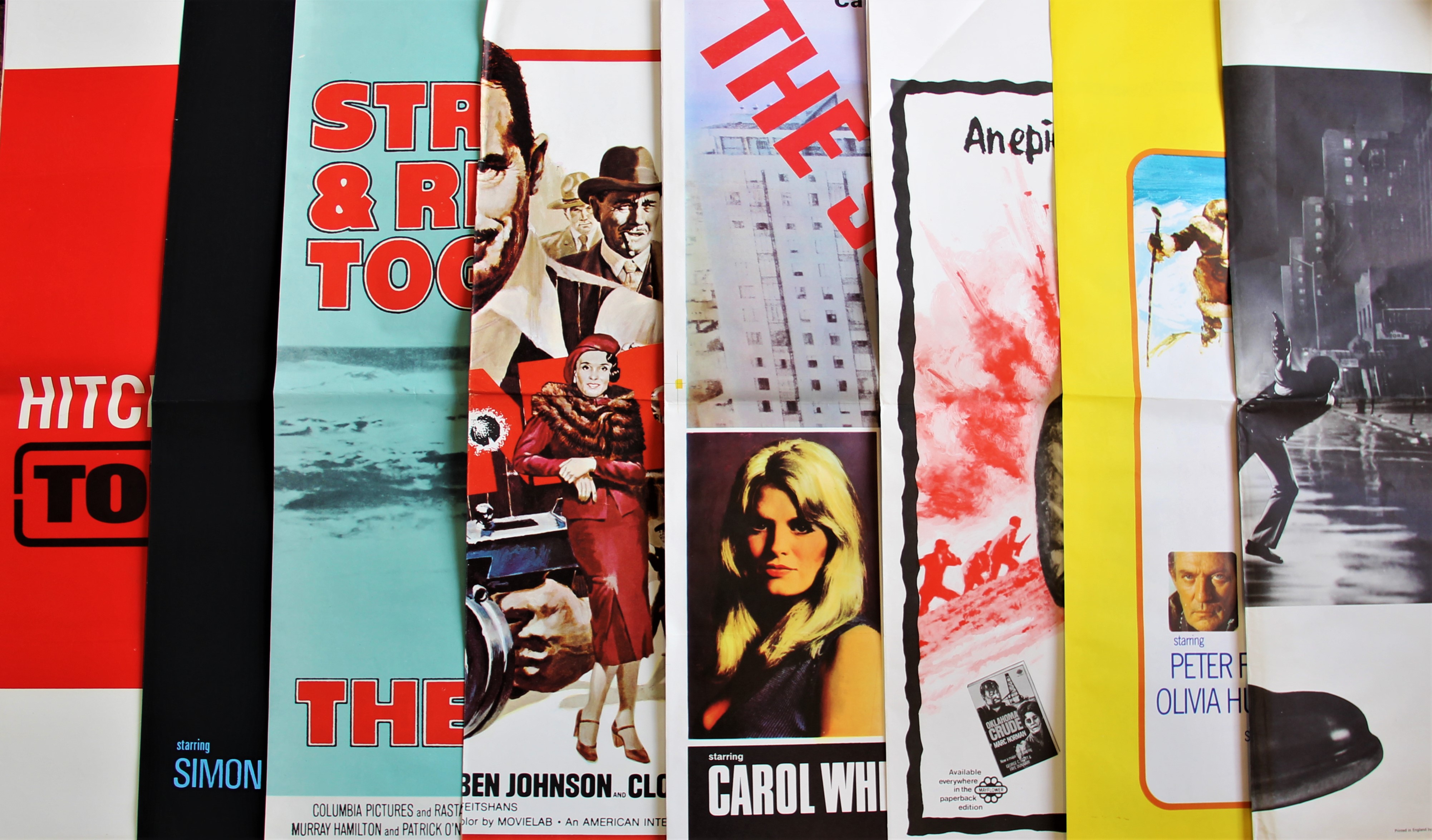 A collection of nine British quad film posters, most dating from the 1970s,