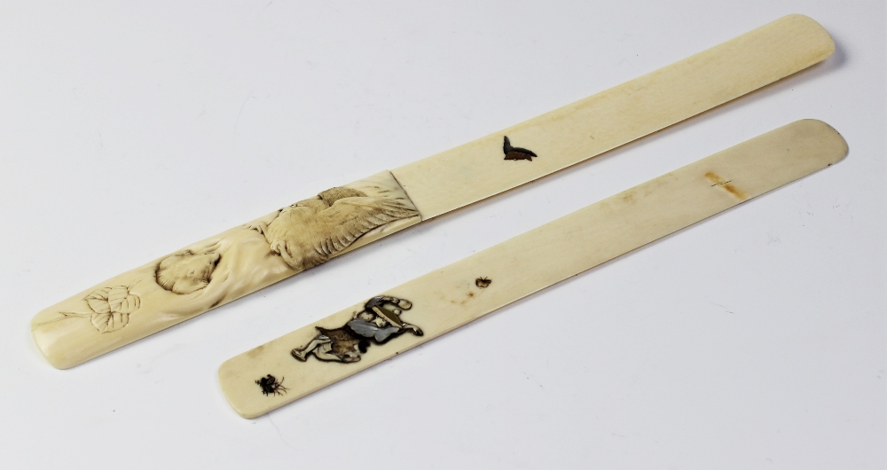 A Japanese ivory shibayama page turner, Meiji period (1868 - 1912), 28cm long, and a further similar