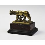 A 19th century Grand Tour type bronzed figure, After an Etruscan original, The Capitoline Wolf,
