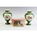 A pair of Coalport vases, circa 1860, each vase of bulbous form painted with two vignettes depicting