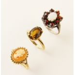 A 9ct gold smokey quartz set dress ring, the stone measuring 11mm x 8mm, ring size N, together