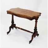A Victorian burr walnut occasional table, the quarter veneered thumb moulded serpentine top,