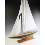 A hand made, scratch built model of the racing yacht 'Shamrock', with cloth sails, cord rigging